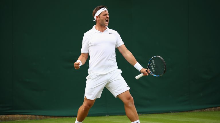 Marcus Willis celebrates winning the first set during the Men's Singles first round match against Ricardas Berankis