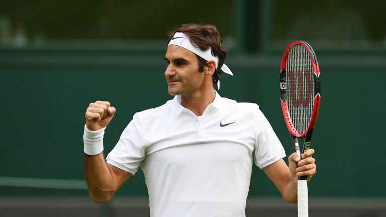 Roger Federer celebrates victory following the Men's Singles first round  against Giodo Pella 