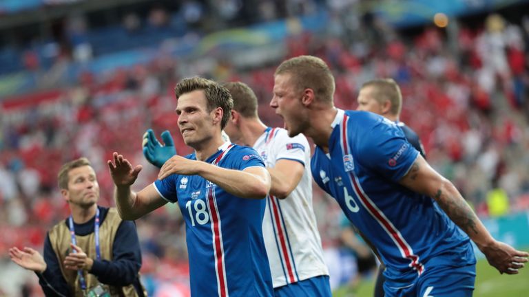 Theodor Bjarnason and Ragnar Sigurdsson celebrate Iceland's victory