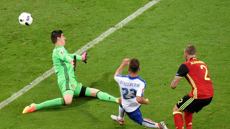 Emanuele Giaccherini shoots past Thibaut Courtois to put Italy ahead against Belgium