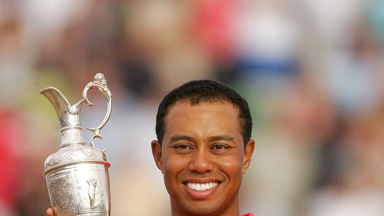 HOYLAKE, UNITED KINGDOM - JULY 23:  Tiger Woods of USA poses with the claret jug following his two shot victory at the end of the final round of The Open C