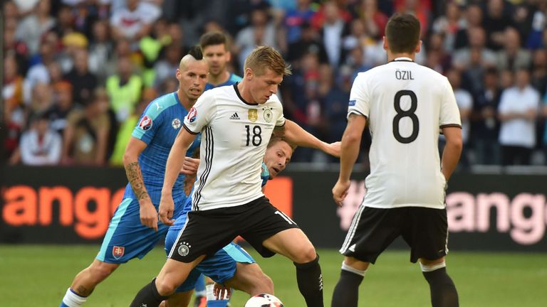 Toni Kroos (C) controls the ball during the Euro 2016 round of 16 football match between Germany and Slovakia
