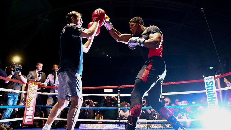 Anthony Joshua working out with trainer Tony Sims at York Hall