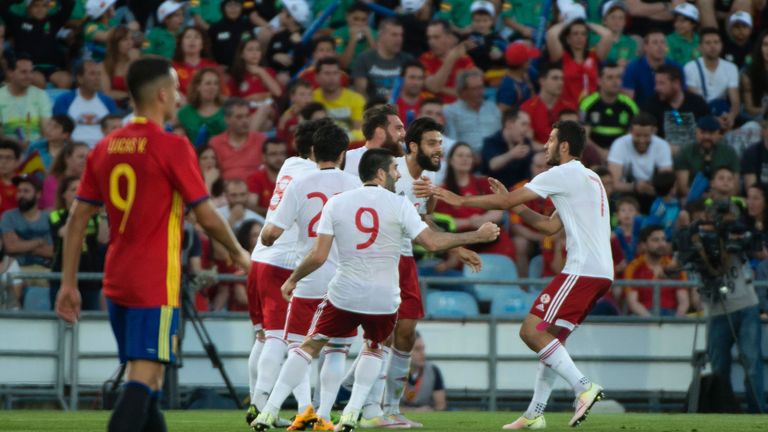 Georgia's midfielder Tornike Okriashvili (2ndR) celebrates with teammates after scoring during the EURO 2016 friendly football match Spain vs Georgia at th
