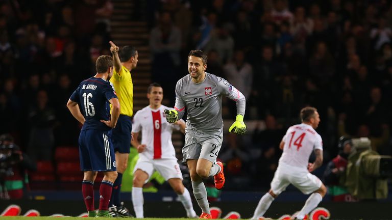 Lukasz Fabianski of Poland celebrates at full time during the UEFA EURO 2016 qualifier between Scotland and Poland at Hamp