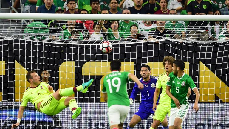 Jose Velazquez scores an acrobatic overhead kick to put Venezuela ahead