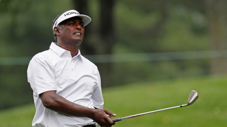 Vijay Singh of Fiji plays a shot on the ninth hole during the second round of the Quicken Loans National 