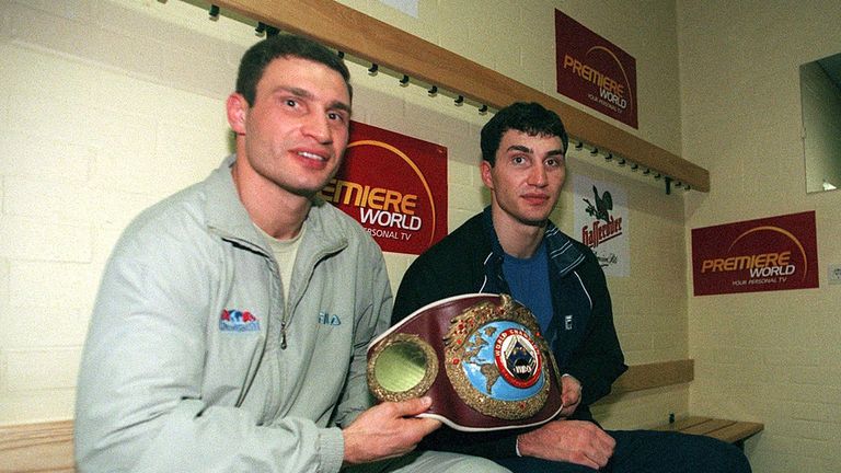 The Klitschko brothers proudly display Wladimir's belt
