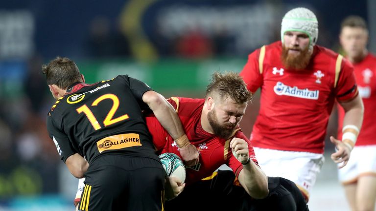 HAMILTON, NEW ZEALAND - JUNE 14: Tomas Francis of Wales is tackled during the International Test match against the Chiefs at Waikato Stadium