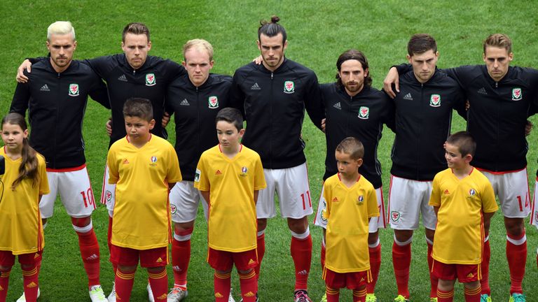 Wales players sing the national anthem before their Euro 2016 clash against Slovakia