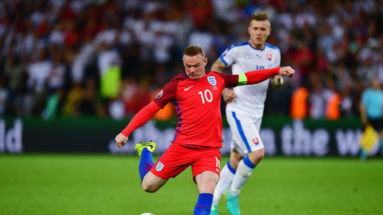 SAINT-ETIENNE, FRANCE - JUNE 20: Wayne Rooney of England shoots at goal during the UEFA EURO 2016 Group B match between Slovakia and England at Stade Geoff