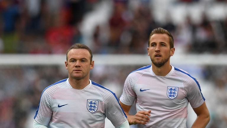 England's forward Wayne Rooney (L) and England's forward Harry Kane warm up ahead of the Euro 2016 group B football match between England and Russia at the