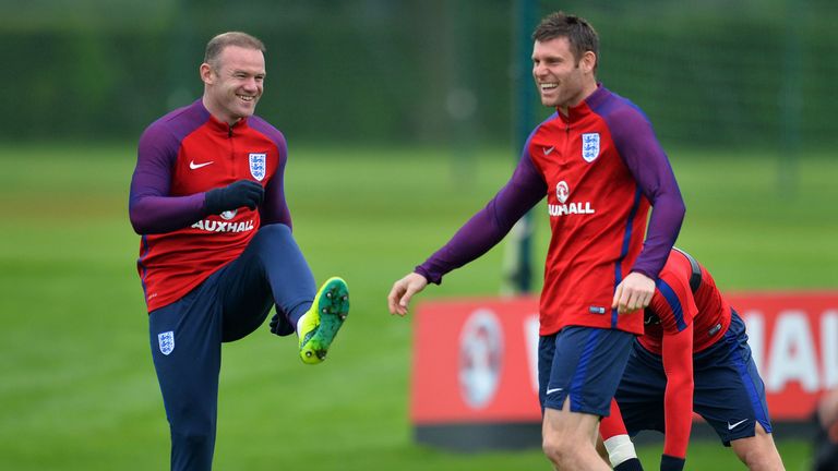 Reid would start Wayne Rooney [L] and James Milner [R] in his England line-up