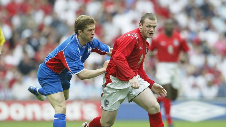 Wayne Rooney holds off Johannes Karl Gudjonsson during England's last meeting with Iceland in 2004