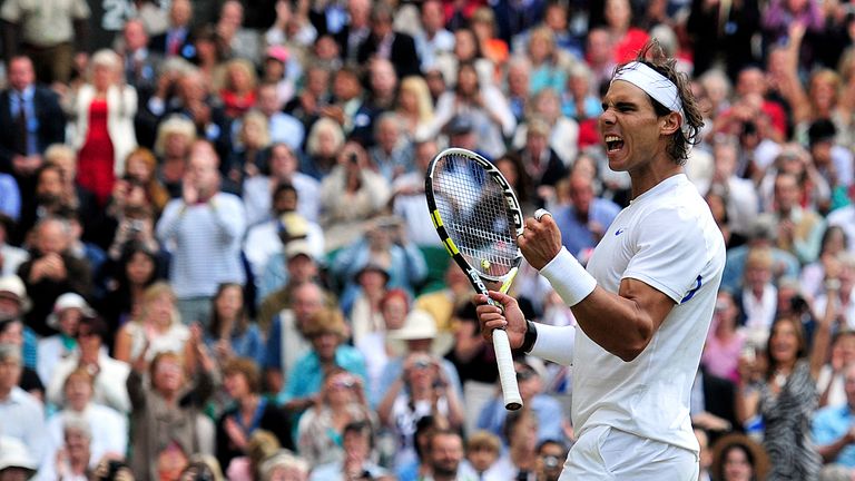 Rafa Nadal reacts after beating Andy Murray during the men's single semi-final at Wimbledon