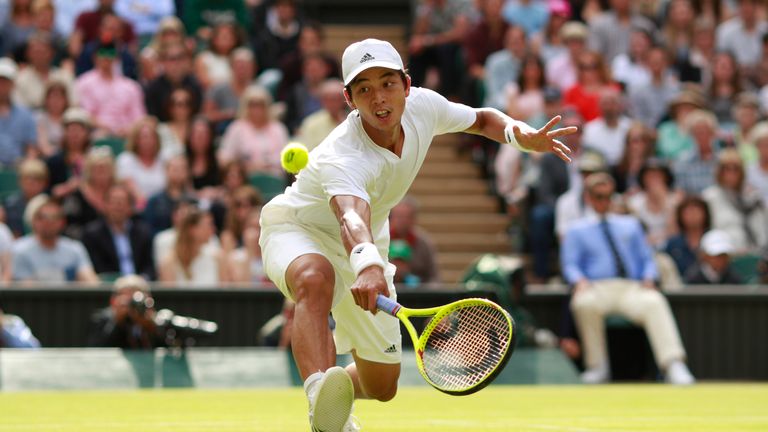 LONDON, ENGLAND - JUNE 30:  Yen-Hsun Lu of Taipei plays a backhand during the Men's Singles second round match against Andy Murray of Great Britain on day 