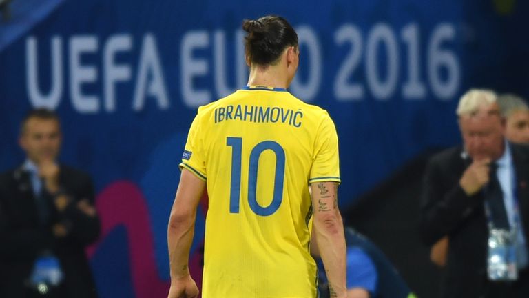 Zlatan Ibrahimovic walks on the pitch after Sweden lost 0-1 to Belgium
