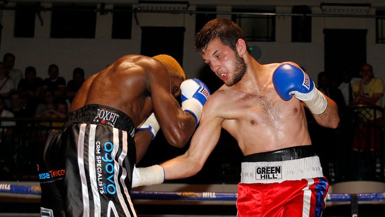 Zoltan Szabo (R) lands a low blow on Ohara Davies