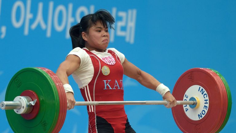 Kazakhstan's Zulfiya Chinshanlo lifts during the women's 53kg weightlifting event during the 2014 Asian Games in Incheon on September 21, 2014. AFP PHOTO /