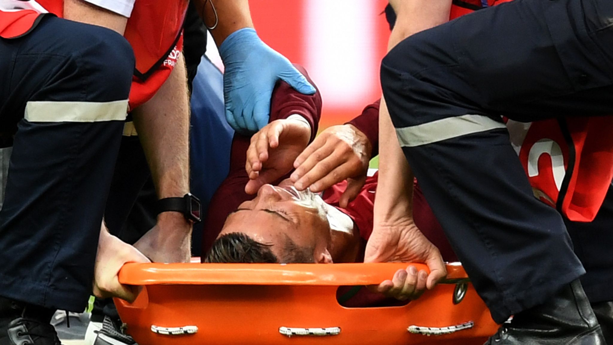 Cristiano Ronaldo stretchered off in tears in Euro 2016 final