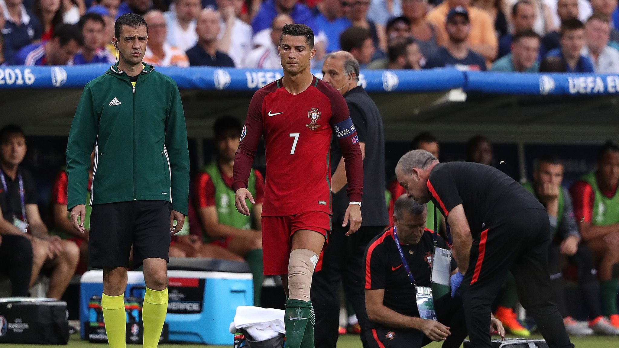 Cristiano Ronaldo stretchered off in tears in Euro 2016 final ...