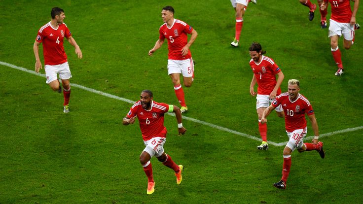 LILLE, FRANCE - JULY 01:  Ashley Williams of Wales celebrates scoring his team's first goal during the UEFA EURO 2016 quarter final match between Wales and