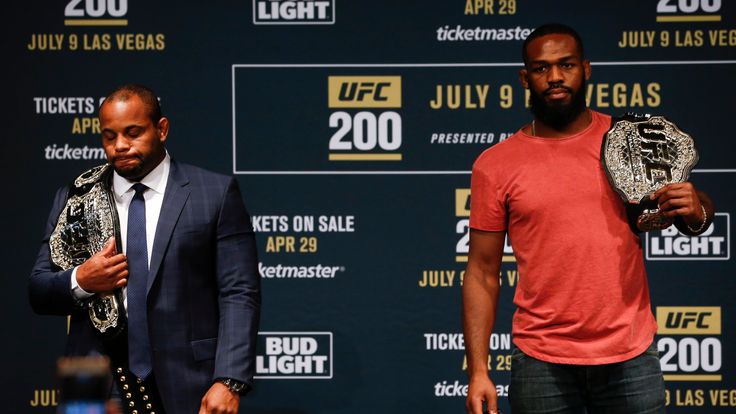 NEW YORK, NY - APRIL 27:  Daniel Cormier (L) and Jon Jones pose for a photo after squaring off during a media availability for UFC 200 at Madison Square Ga