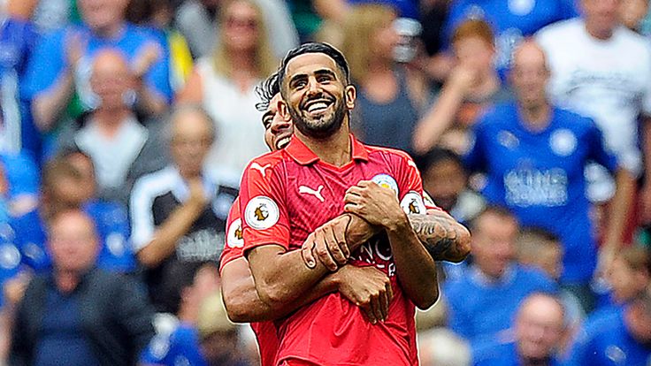 Riyad Mahrez is lifted up by Leicester team-mate Leonardo Ulloa after scoring against Celtic