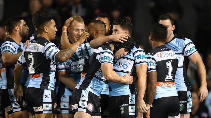 SYDNEY, AUSTRALIA - JULY 10: Sharks players celebrate a try during the round 18 NRL match between the Penrith Panthers and the Cronulla Sharks at Pepper St