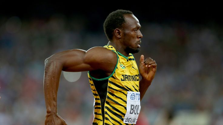 BEIJING, CHINA - AUGUST 25:  Usain Bolt of Jamaica competes in the Men's 200 metres heats during day four of the 15th IAAF World Athletics Championships Be