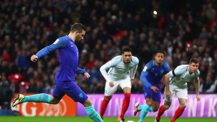 LONDON, ENGLAND - MARCH 29: Vincent Janssen of the Netherlands scores the equalising goal from a penalty during the International Friendly match between En