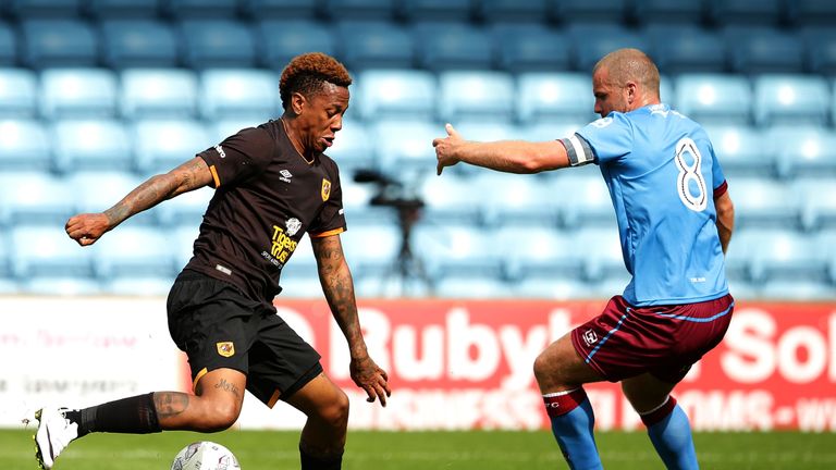Abel Hernandez of Hull City takes on Stephen Dawson of Scunthorpe United during a pre-season friendly 