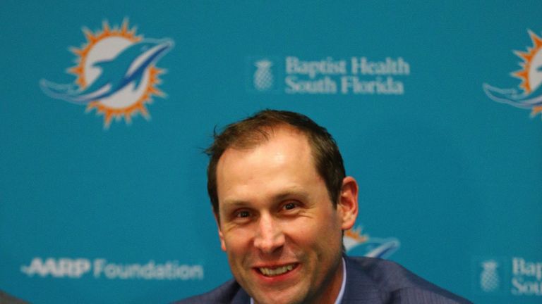 DAVIE, FL - APRIL 29:  Head coach Adam Gase of the Miami Dolphins talks to members of the press concerning first round draft pick Laremy Tunsil at their tr