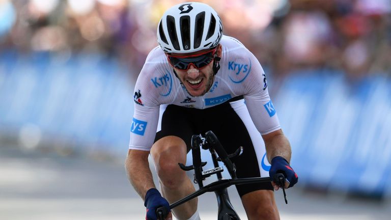 Great Britain's Adam Yates, wearing the best young's white jersey, crosses the finish line at the end of the 17 km individual time-trial, the eighteenth st