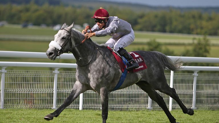 Julien Auge riding Al Mourtajez win The Qatar International Stakes at Goodwood, the Group One race for Arab-bred horses.