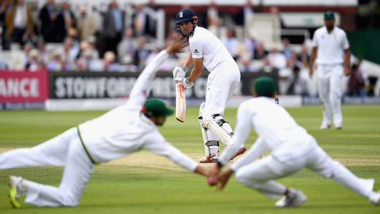 England captain Alastair Cook plays the ball between Azhar Ali and Younis Khan