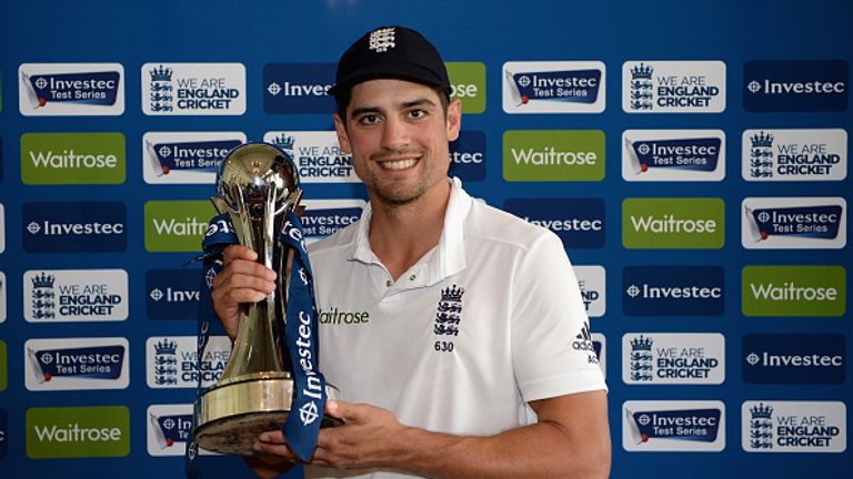 LONDON, ENGLAND - JUNE 13:  England captain Alastair Cook holds the series trophy in Long Room after winning Investec Test series between England and Sri L