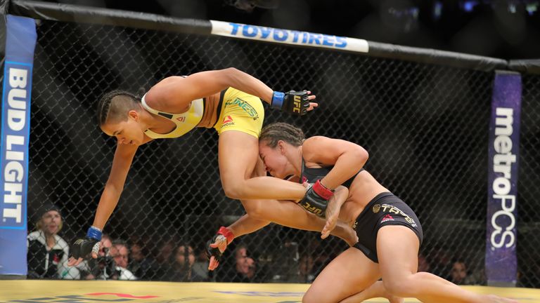 LAS VEGAS, NV - JULY 9: Miesha Tate looks to take down Amanda Nunes during the UFC 200 event at T-Mobile Arena on July 9, 2016 in Las Vegas, Nevada. (Photo