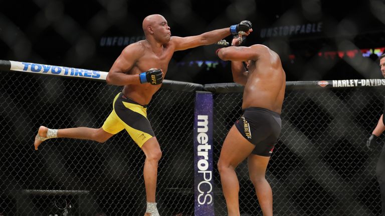 LAS VEGAS, NV - JULY 9: Anderson Silva punches Daniel Cornier (R) during the UFC 200 event at T-Mobile Arena on July 9, 2016 in Las Vegas, Nevada. (Photo b