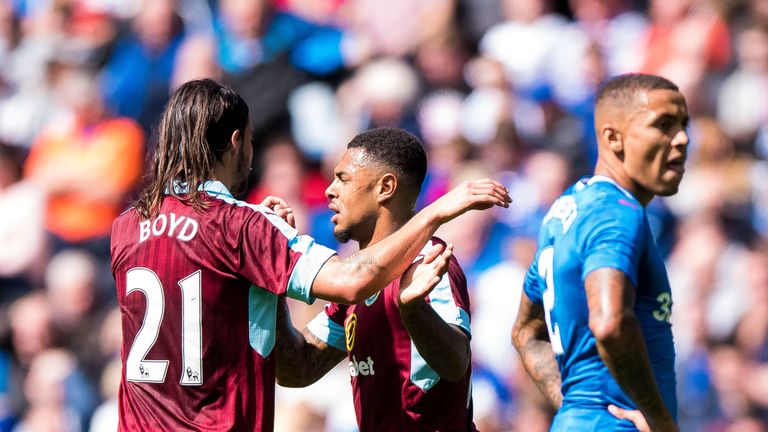 Burnley's Andre Gray (centre) celebrates scoring his second goal during the pre-season friendly match v Rangers at the Ibrox Stadium, Glasgow