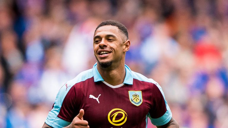 Burnley's Andre Gray celebrates scoring his third of the game during the pre-season friendly match at the Ibrox Stadium, Glasgow.