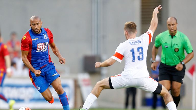 CINCINNATI, OH - JULY 16: Andros Townsend #17 of Crystal Palace FC moves the ball past Francisco Narbon #13 of FC Cincinnati during the second half at Nipp