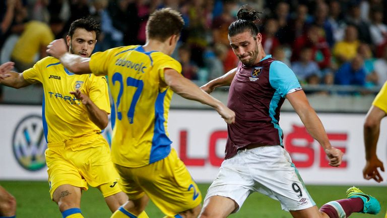 LJUBLJANA, SLOVENIA - JULY 28: Andy Carroll (R) of West Ham in action against Gaber Dobrovoljc (L) of Domzale during the UEFA Europa League Third qualifyin