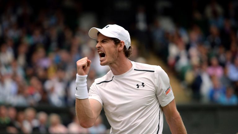 Andy Murray celebrates against Jo-Wilfried Tsonga on day nine of the Wimbledon Championships at the All England Lawn Tennis and Croquet Club, Wimbledon.