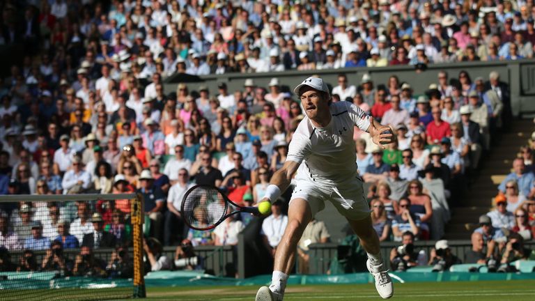 Britain's Andy Murray misses a return against Czech Republic's Tomas Berdych during their men's singles semi-final match on the twelfth day of the 2016 Wim