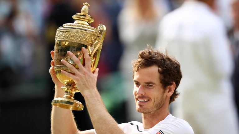 Andy Murray of Great Britain lifts the Wimbledon trophy 