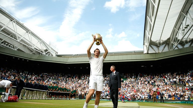  Andy Murray of Great Britain lifts the Wimbledon trophy 