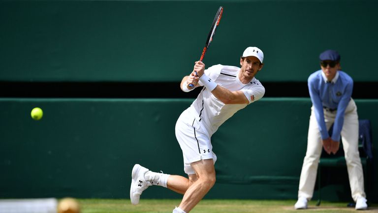 Andy Murray returns