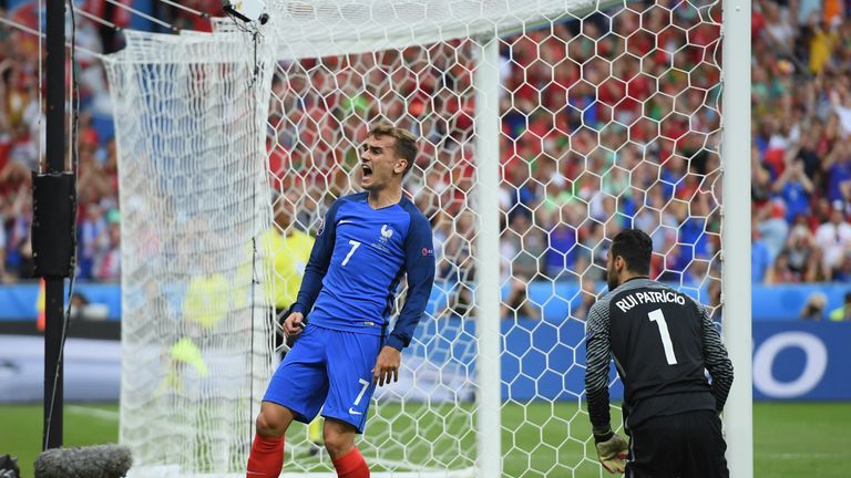 Antoine Griezmann of France reacts after missing a chance 