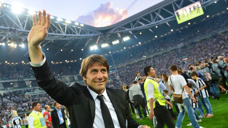 Juventus' coach Antonio Conte celebrates winning the Scudetto,